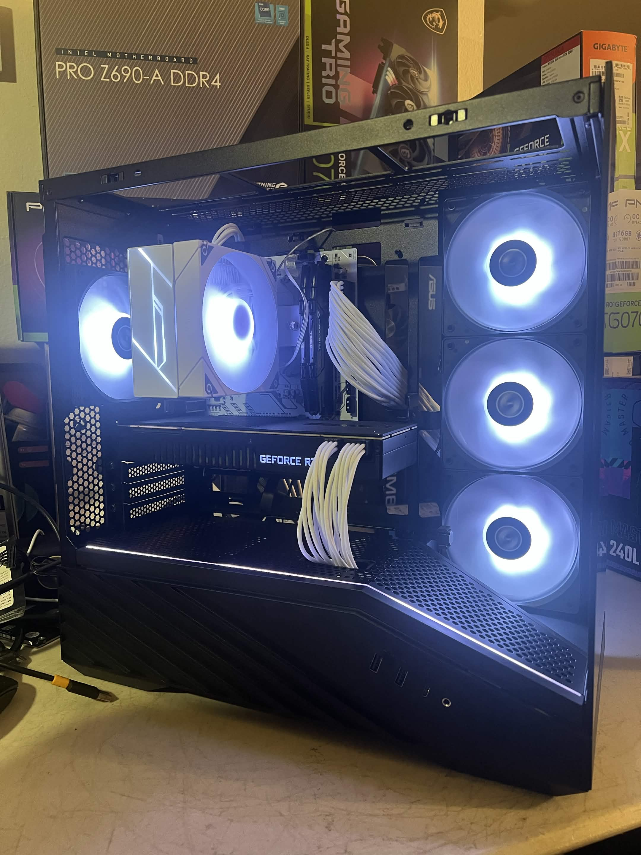 White cooling and cabling inside a panoramic glass case.